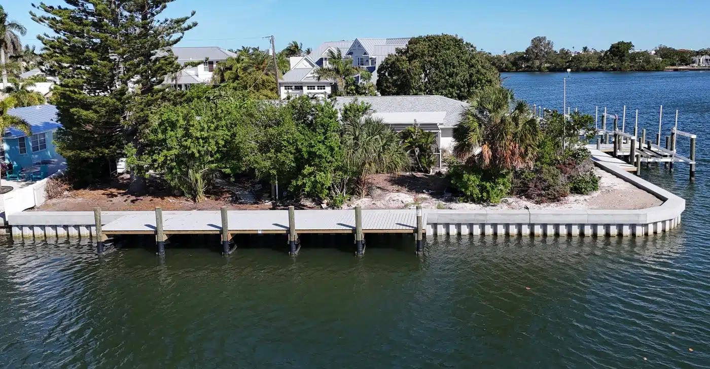 Holmes Beach Curved Seawall Azek Dock Dual Deco Boat Lifts